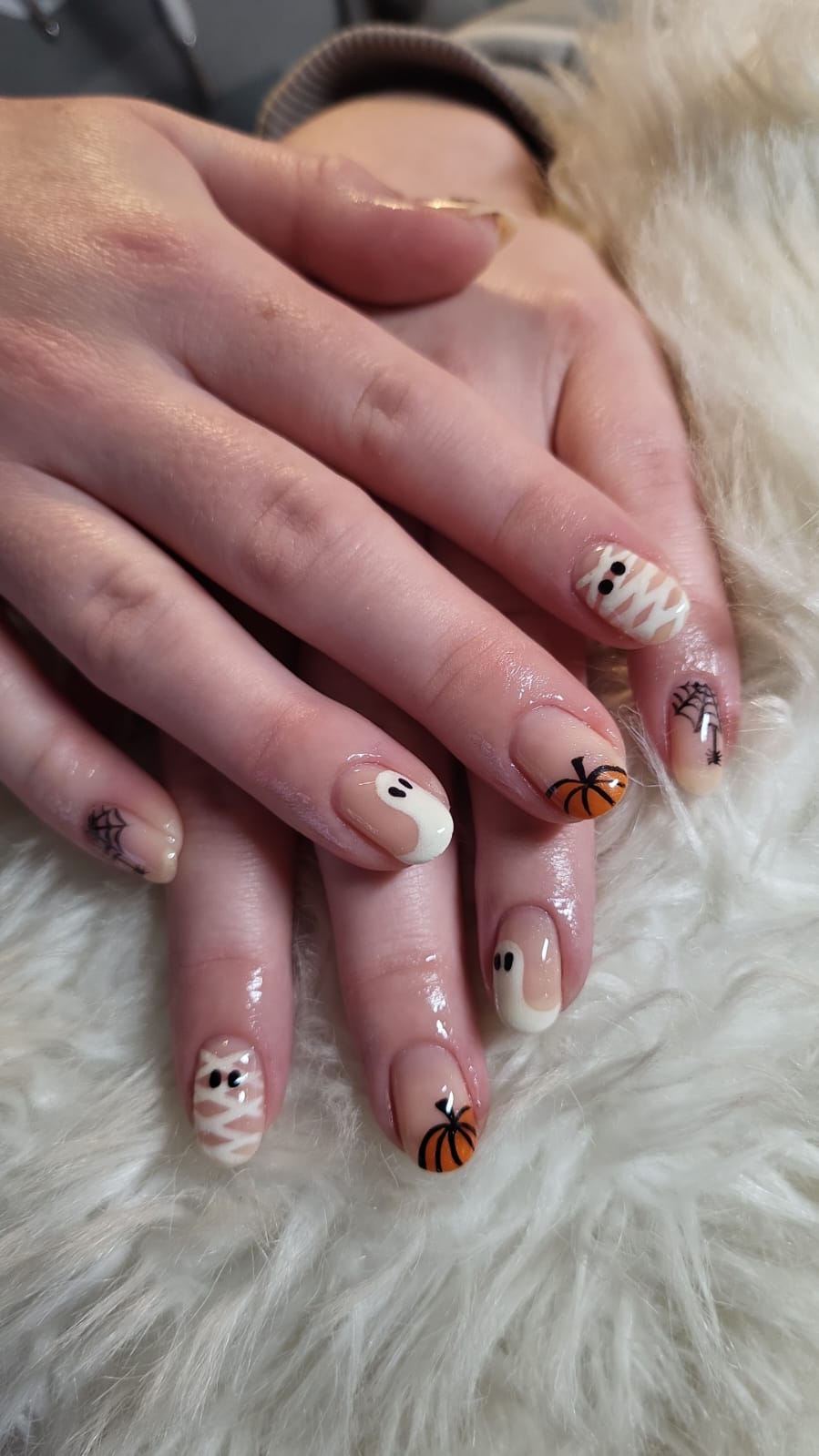 Halloween ghosts pumpkin and webs